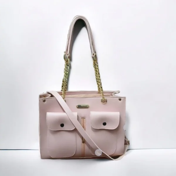 Pink bucket bag with strap, great for everyday use.