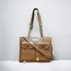 Chochlate Brown bucket bag with strap, great for everyday use.