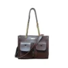 Brown bucket bag with strap, great for everyday use.